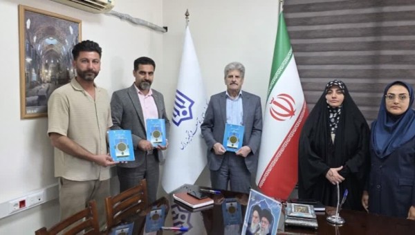 انعقاد تفاهمنامه احداث زمین چمن مصنوعی در مدرسه چهارده معصوم روستای ایبکآباد